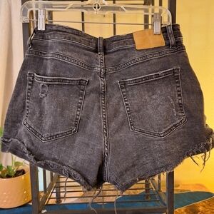 Distressed black cutt-off denim shorts